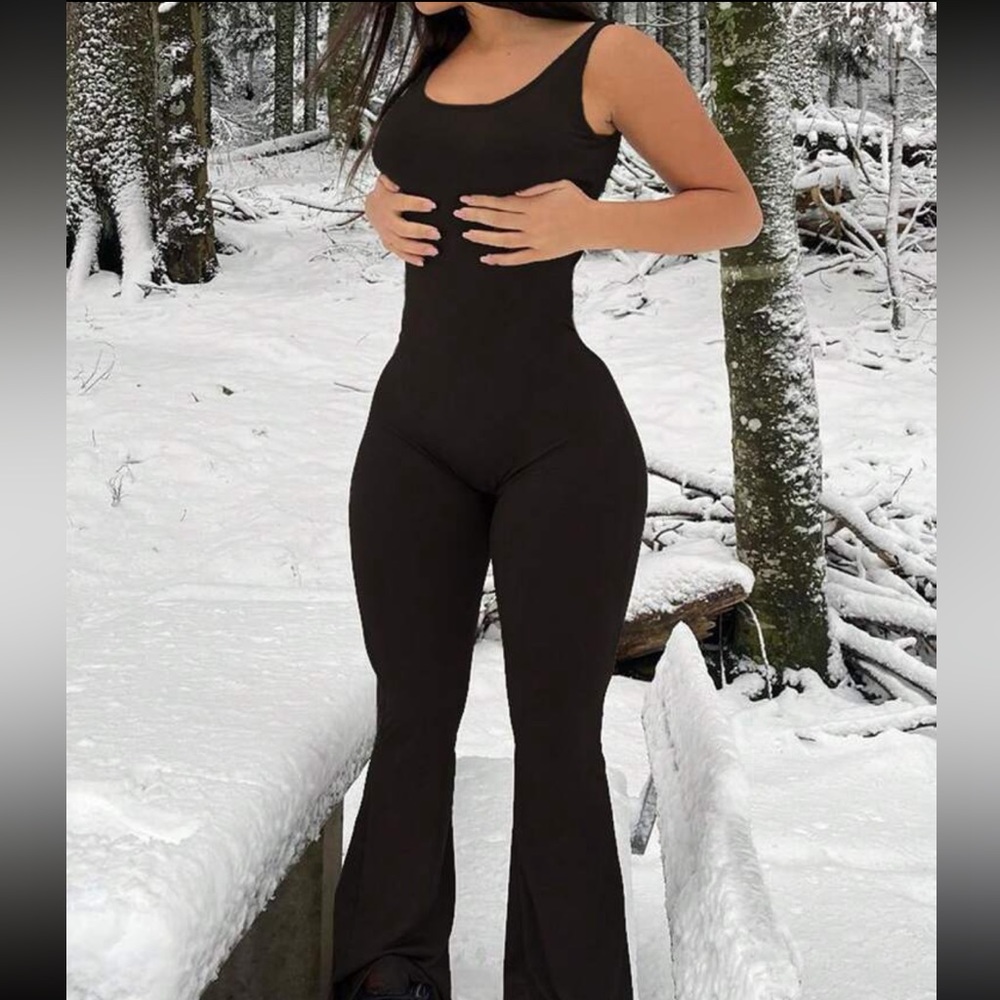 Sexy black tank top body jump suit with flare pants